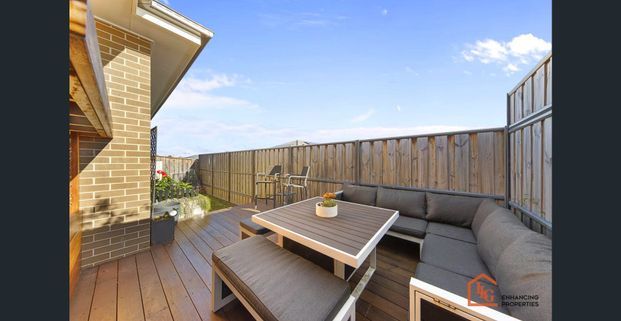 Sophisticated Family Home with Versatile Living & Outdoor Appeal - Photo 1