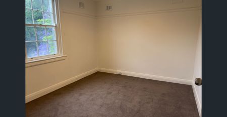 Oversized Top-Floor 2-Bedroom Unit with Sunroom & Park Views - Photo 3