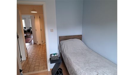 Een appartement op de eerste verdieping met garage en tuintje - Photo 5