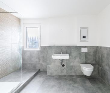 Frisch sanierte 2-Zimmer-Wohnung im Erstbezug mit Terrasse & Stellp... - Photo 2