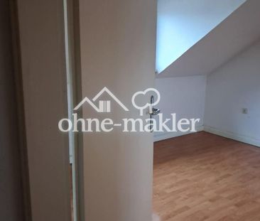 Großzügig geschnittene DG-Wohnung in verkehrsgünstiger Lage von Rat... - Foto 1