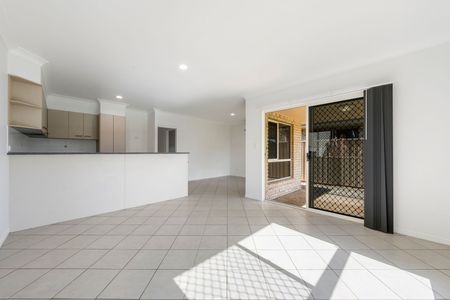 Coastal Comfort Awaits: Your Modern Haven in Woody Point - Photo 4