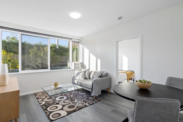 Spacious and sunlit in a sought-after street - Photo 1