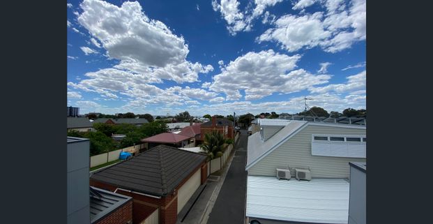 Beautiful Townhouse in the Heart of Town - Photo 1