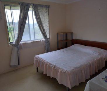 Shared furnished high set house on quite street walking distance to... - Photo 1