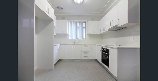 Spacious 4 Bedroom Home - Photo 1