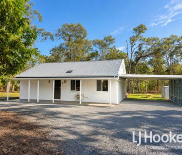 Acreage Living without the Upkeep - Renovated Cottage Charm - Photo 1