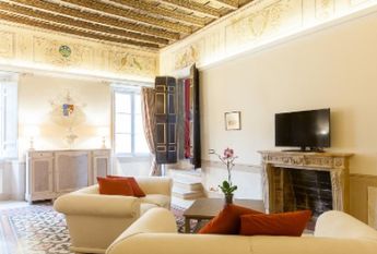 Center-Historic Jewish Quarter: Elegant apartment situated in beautiful Palazzo Nobiliare. Entrance, spacious living with original wood frescoed ceilings, large modern dining and kitchen, 4 bedrooms, 4 Baths, small terrace. #1527