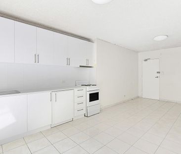 Top Floor One Bedroom With Lock Up Garage - Photo 3