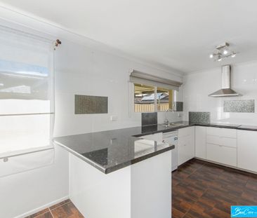 Comfortable Family Living with a Generous Backyard - Photo 4