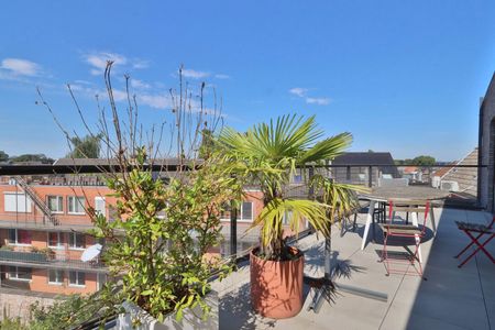 Penthouse met garage op het kerkplein van Melsele! - Foto 4