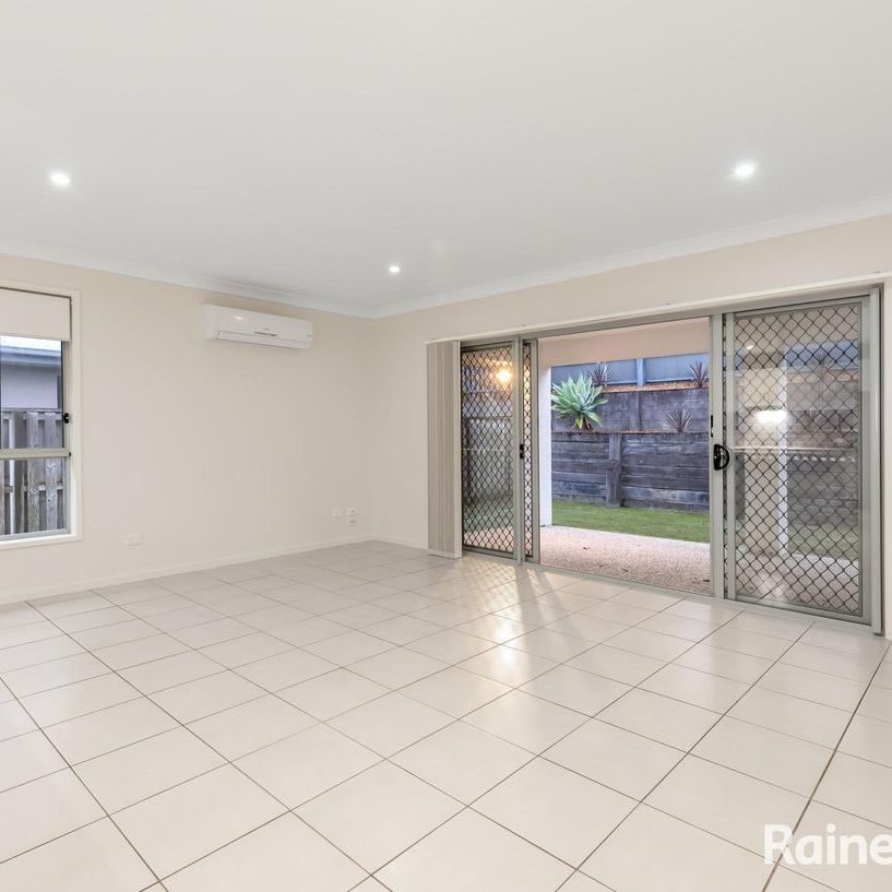 Beautifully Lanscaped Coomera Family Home - Photo 1