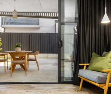 Sophisticated and Stylish Two Bedroom Unit - Photo 5