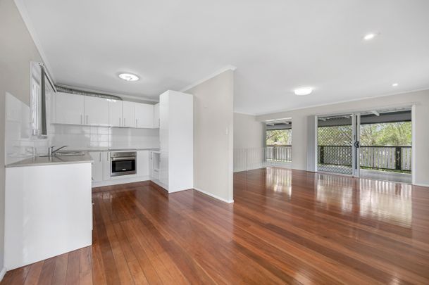 A charming home set on a generous block with a sprawling backyard. - Photo 1