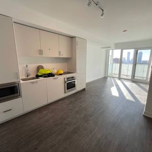 Brand New Queen St. East Condo 5 mins walk to Eaton center for Rent - Photo 2