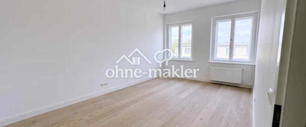 Renovierte 4-Zimmer Neubau Wohnung mit Stellplatz in zentraler Lage - Foto 1