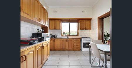 Charming Family Home with Modern Comforts & a Spacious Yard - Photo 4