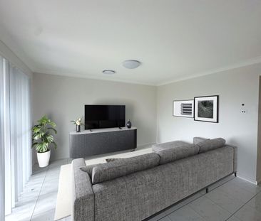 Brand New Home with Ducted A/C - Photo 3