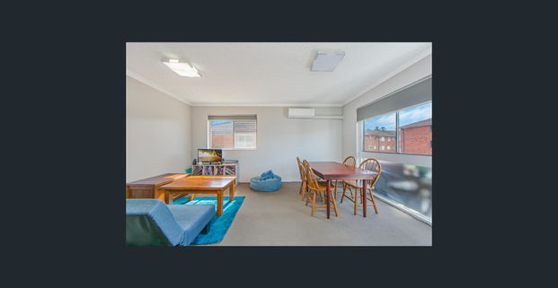 Modern Top Floor, 2 Bedroom Unit with Garage - Photo 1