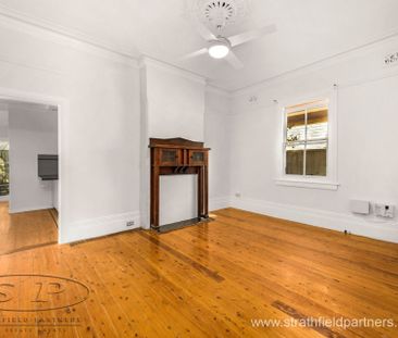 Located in a peaceful tree-lined Street - Photo 1