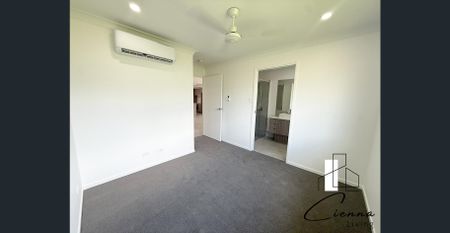 Spacious 4-Bedroom, 2-Bathroom House - Photo 2