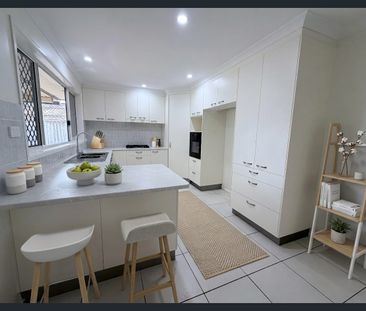 Freshly Renovated Family Home with a Spacious Backyard - Photo 6