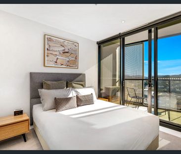 Furnished Modern 1-Bedroom Apartment in the Iconic FV “Flatiron” Tower - Photo 3