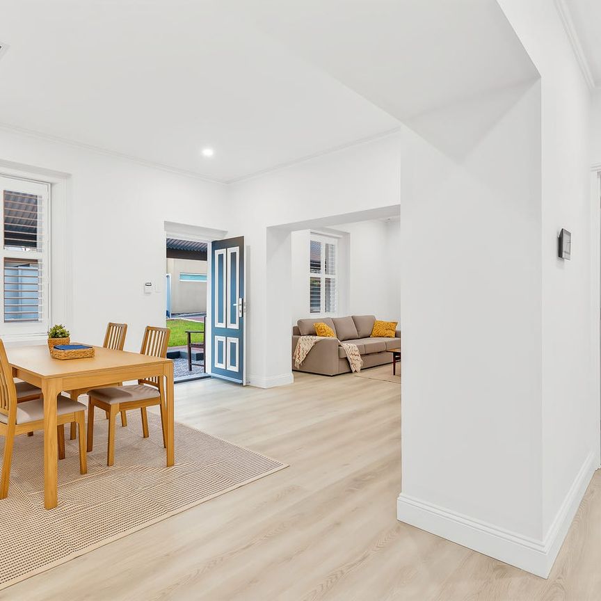 Updated Cottage in Prestigious Suburb - Photo 1