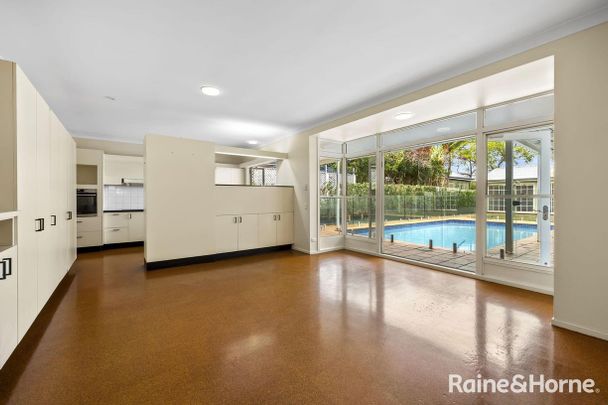 Expansive Family Home with Pool, Multiple Living Zones and City Views - Photo 1