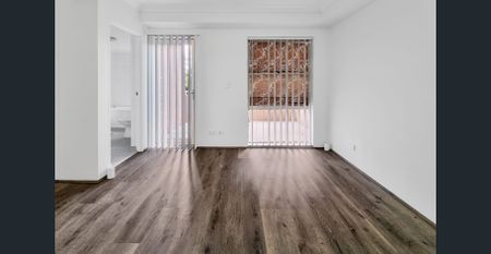 RENOVATED 3 BEDROOM DOUBLE STOREY APARTMENT WITH NEW FLOORING THROUGH-OUT - Photo 2