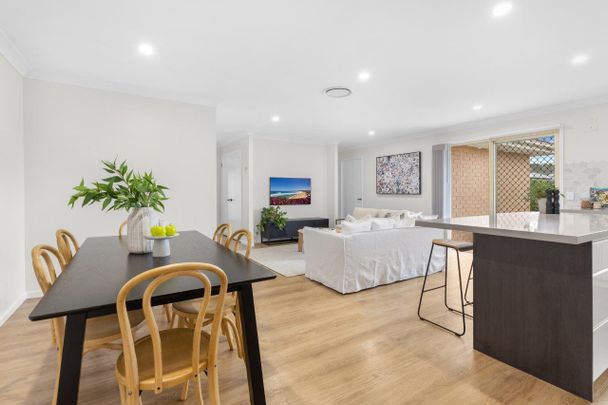 8 Harcourt Parade, Macquarie Hills NSW 2285 - House For Rent | Domain - Photo 1