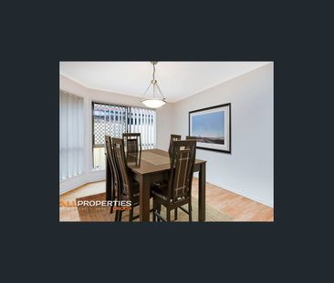 VERSATILE FAMILY RESIDENCE FEATURING MULTIPLE LIVING AREAS - Photo 3