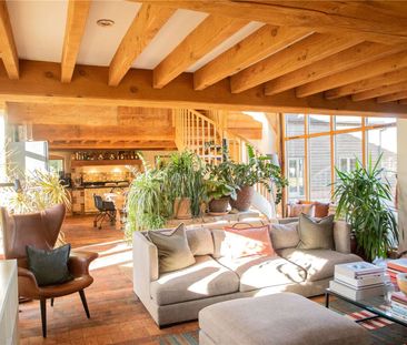 A beautifully presented 4-bedroom barn conversion with gated entran... - Photo 4