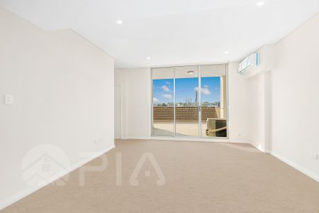 Modern 2 bedroom apartment close to amenities for lease - Photo 3