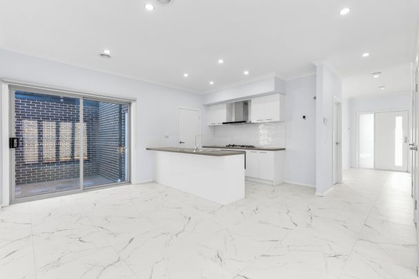 Spacious & Light-Filled Home in Prime Location - Photo 1