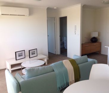 Light-Filled Apartment in a Convenient Harrison Location - Photo 3