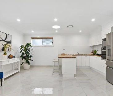 “Modern Family home in Matthew Pearce Catchment!” - Photo 1