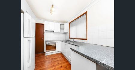 WELL-LOCATED FAMILY HOME WITH SPACIOUS YARD - Photo 3