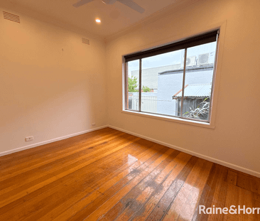 Charming Family Home with Spacious Yard in a Convenient Location - Photo 3