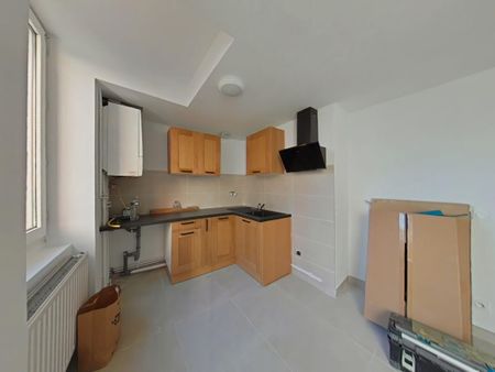 Location Appartement 3 pièces 59m² ROMANS SUR ISERE 26100 - Photo 2