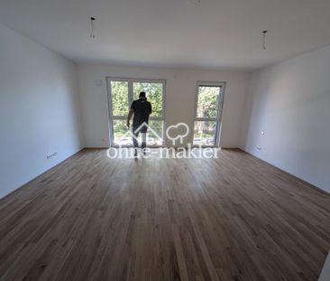 Neubauwohnung exklusiv - Erstbezug mit Balkon, Tiefgarage und Keller - Photo 4