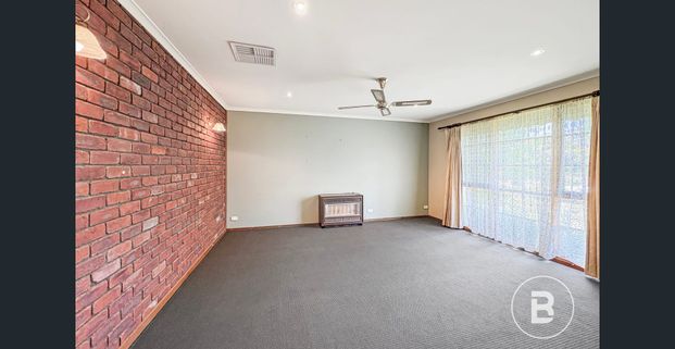 Spacious Home with Two Livings and New Carpet - Photo 1