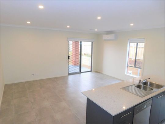 FOUR BEDROOM FAMILY HOME WITH LANDSCAPED GARDENS - Photo 1