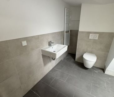 Erstbezug: 2 Zimmer-Dachgeschosswohnung Nähe Bahnhof - Foto 3