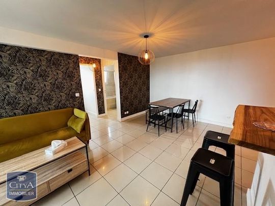 Location Appartement 3 pièces 55m² LA POSSESSION 97419 - Photo 1