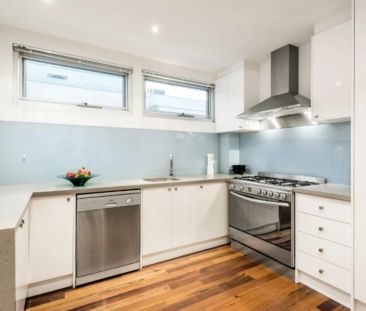 Industrial-Style Warehouse Living with Private Rooftop Terrace - Photo 6