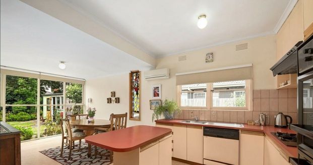 Comfortable Living in a Great Location! - Photo 1
