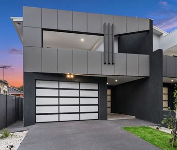 CONTEMPORARY DUPLEX IN PRIME LOCATION - Photo 1