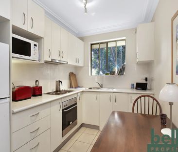 Peaceful Apartment in Leafy Locale - Photo 4