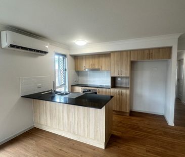Modern 3-Bedroom Duplex with Quality Finishes & Secure Garage - Photo 2